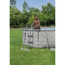 Aufstellpool 'Power Steel™ Swim Vista Series™' Komplett-Set mit Sandfilteranlage cremegrau Steinwand-Optik oval 488 x 305 x 107 cm