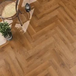 Laminat 'Ville Benicarlo' Fischgrät Eiche honig 8 mm